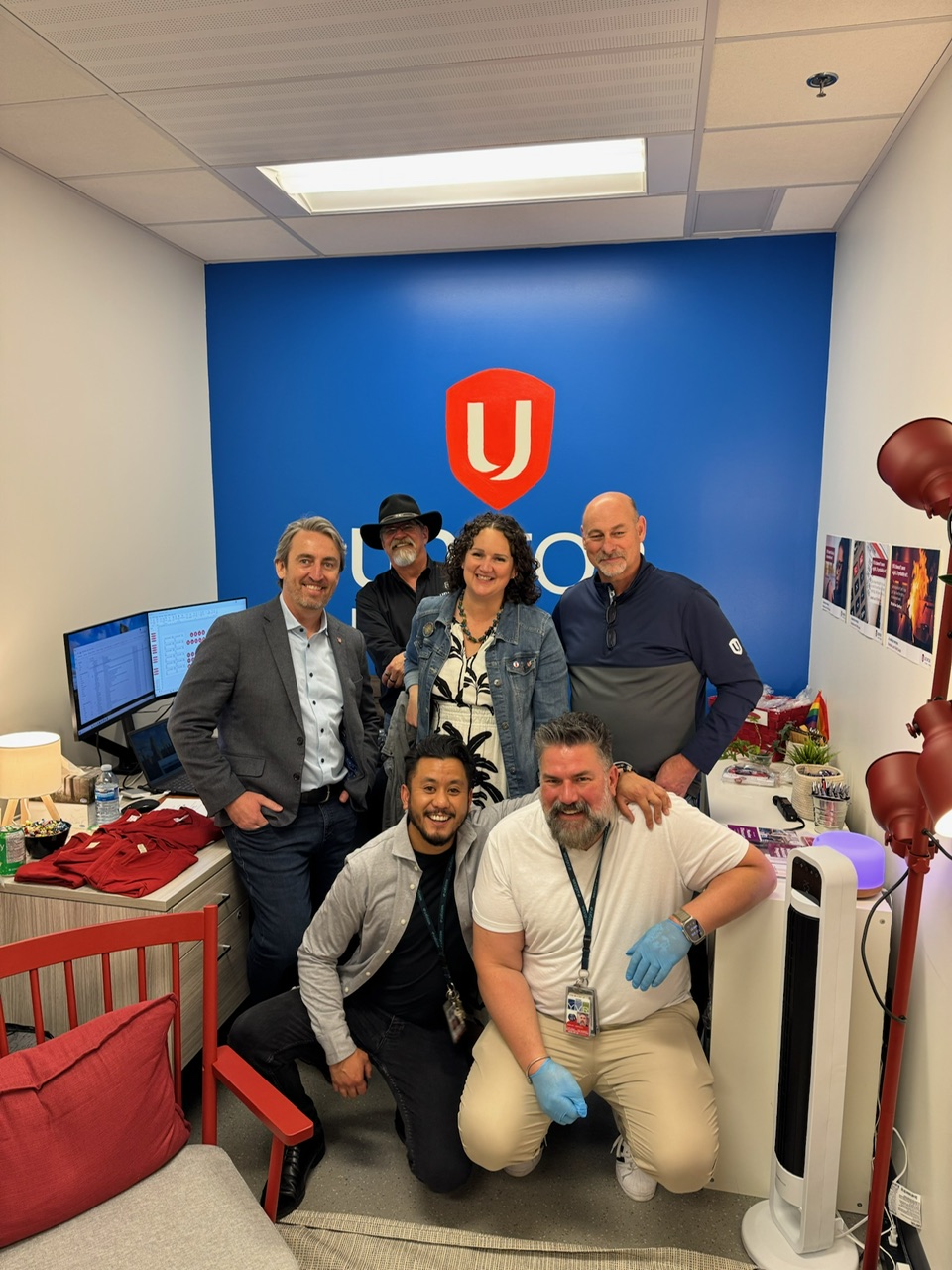 Unifor President Karen Berry stands with Unifor National Staff Len, Guy and Guy with Sherwin and Mark.